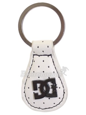 D�msk� kl��enka z imitace k��e s barevn�m podkladem a pro�it�m. Velk� kovov� logo DC.
