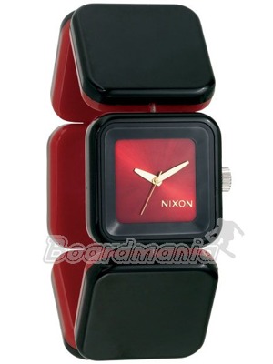 Elegantn� d�msk� hodinky Nixon. Tvrzen� miner�ln� skl��ko a polykarbon�tov� t�lo se stahovac� gumi�kou. Univerz�ln� velikost.